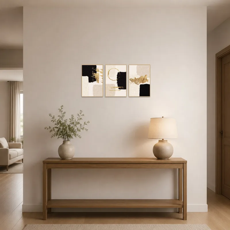 Abstract triptych with bold strokes greets visitors in the entrance hall.