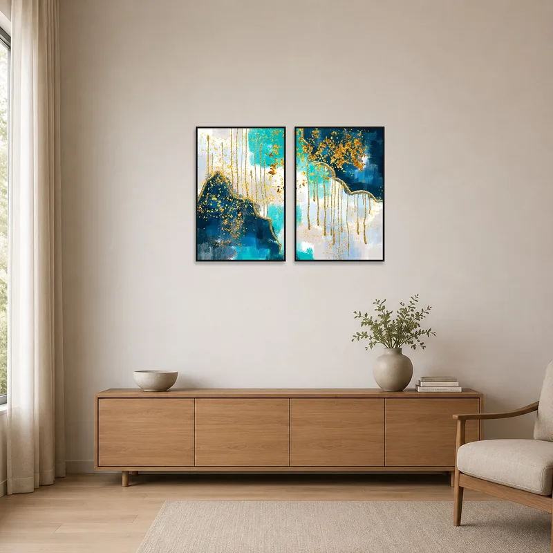 Abstract blue and gold art set accentuating a minimalist interior.