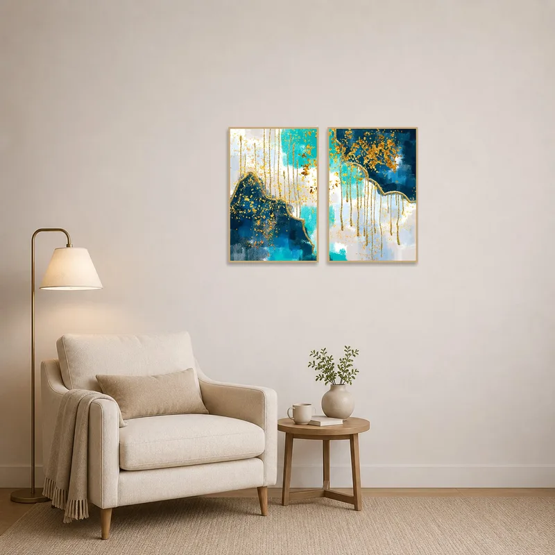 Abstract artwork pair in calming blue and gold tones in a cozy reading corner.