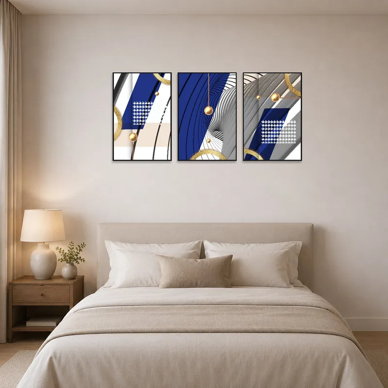 Triptych art set creates a calming atmosphere above a bed.