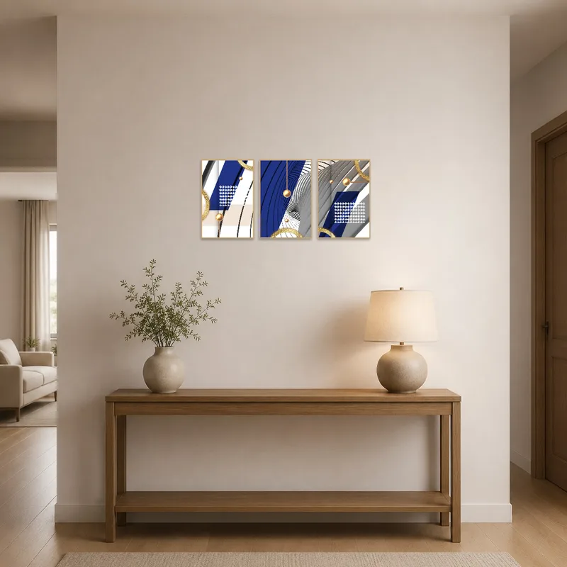 Abstract triptych greets with vibrant hues in an entrance hall.