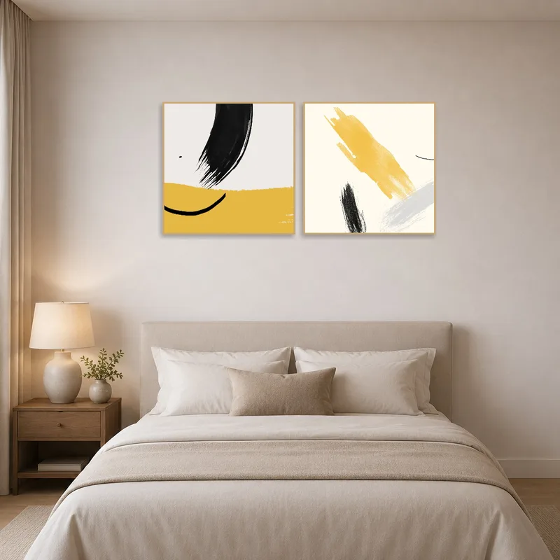 Warm-toned abstract art provides a calming atmosphere in the bedroom.