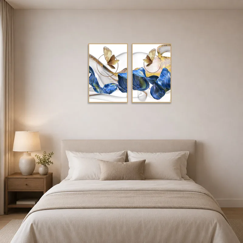 Serene bedroom with abstract butterfly and waves art over the headboard.