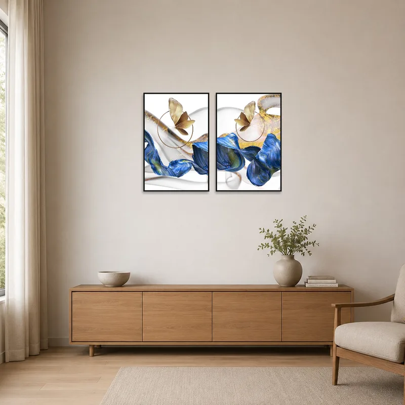 Minimalist setting featuring butterfly and waves art against a clean white wall.