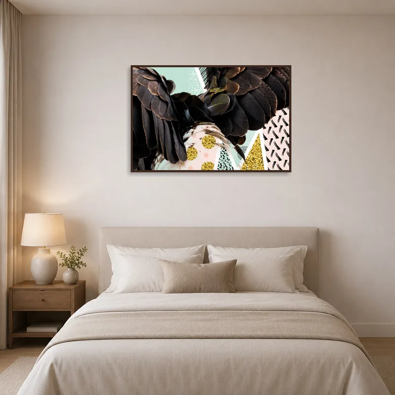 Abstract artwork with bird feathers adds elegance to a bedroom wall.