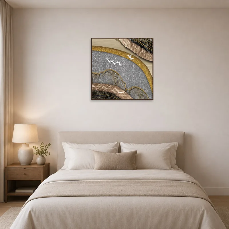Bold metallic artwork enhances the ambiance above a bedroom headboard.