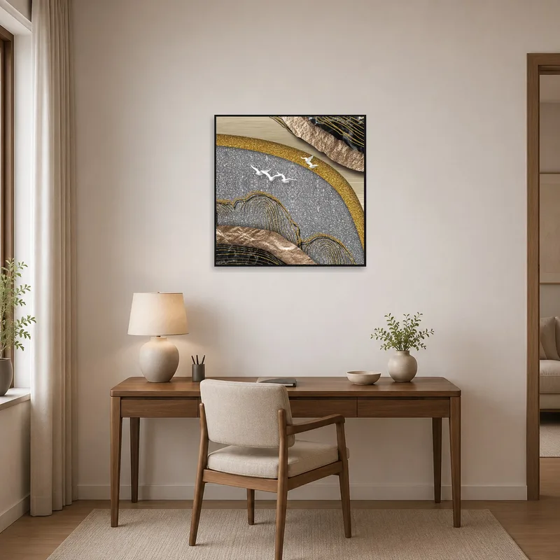 Modern home office features an abstract composition with metallic textures on the wall.