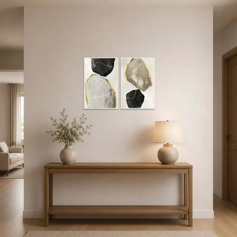 Abstract earth tones and gold piece creating an inviting entrance hall.
