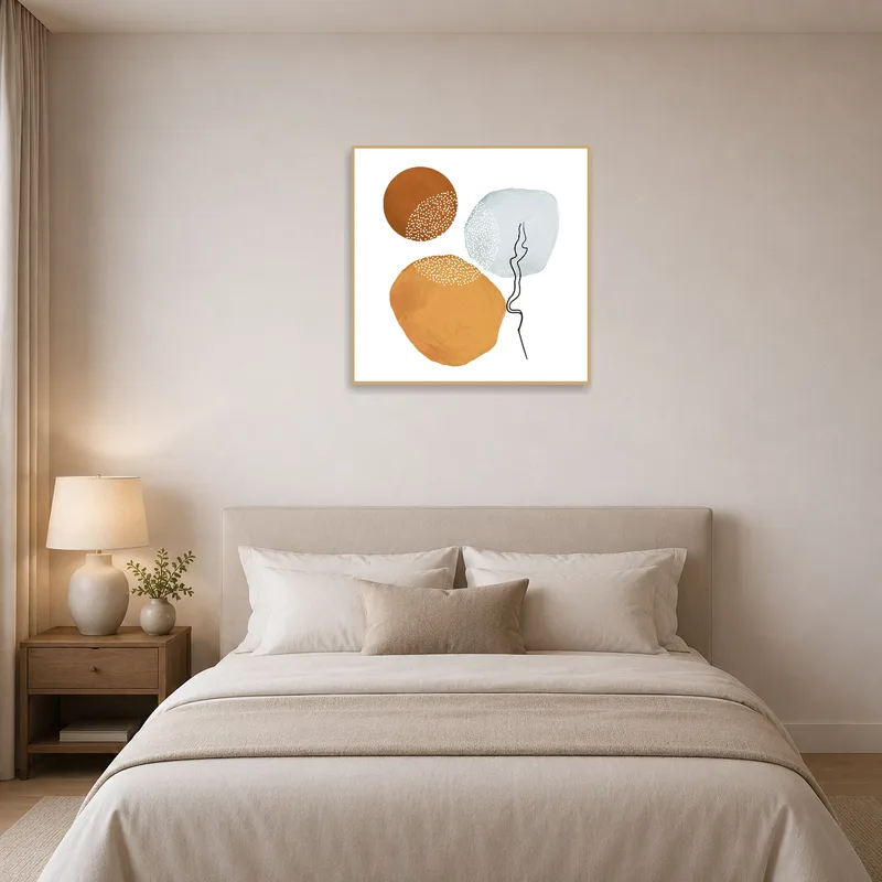 Bedroom wall with abstract circle art offering a cozy vibe.