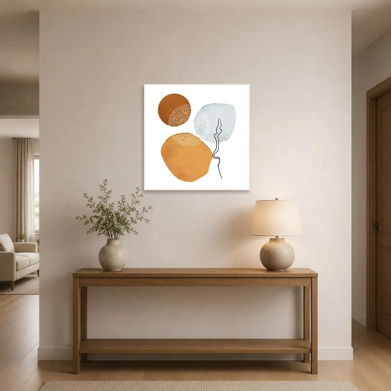 Earthy circle art greeting guests in a stylish entrance hall.