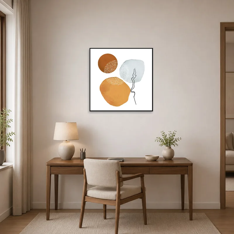 Office space with earth tone circle art inspiring focus and creativity.
