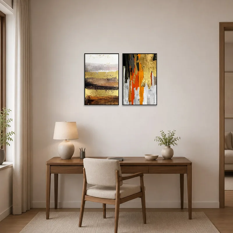 Home office with abstract textured earth-tone art set on the wall.