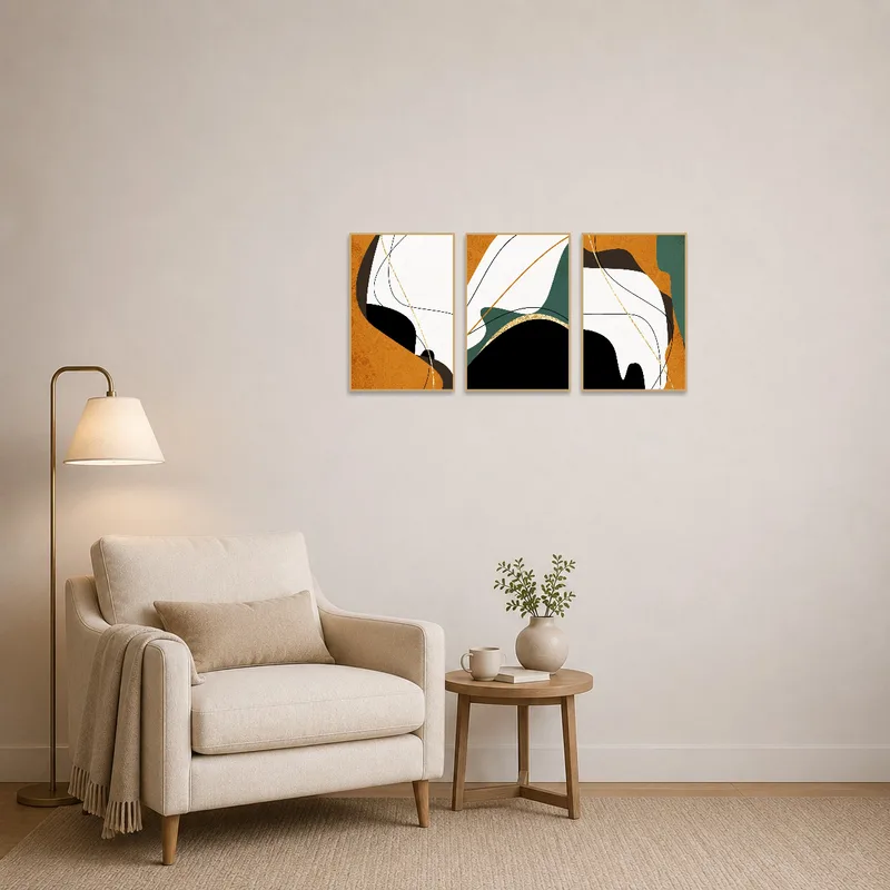 Reading corner warmed by an abstract earth tones triptych on the wall.