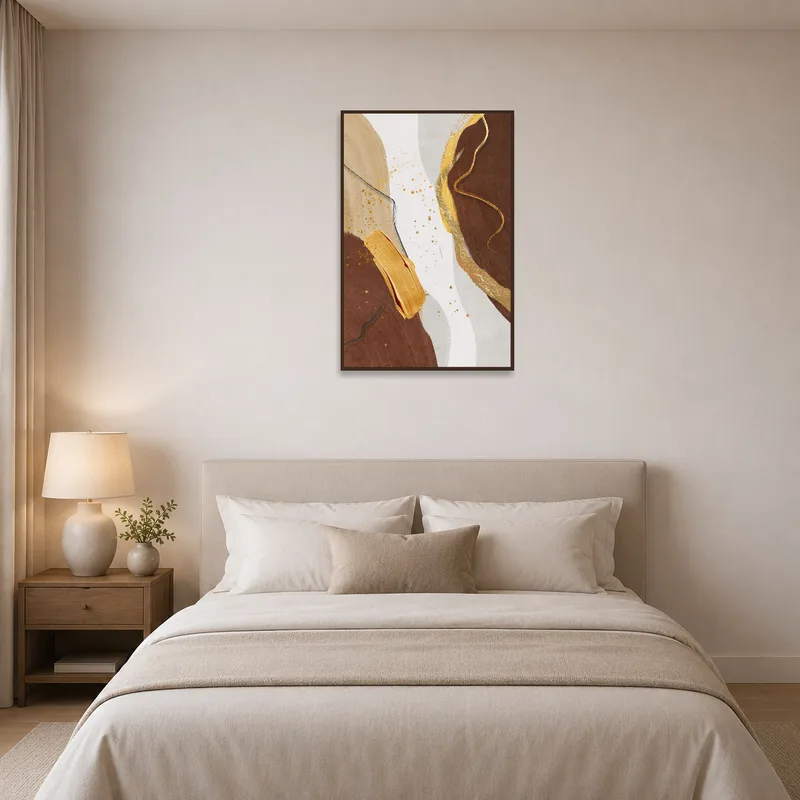 Bedroom showcasing abstract art in earth tones and gold accents.