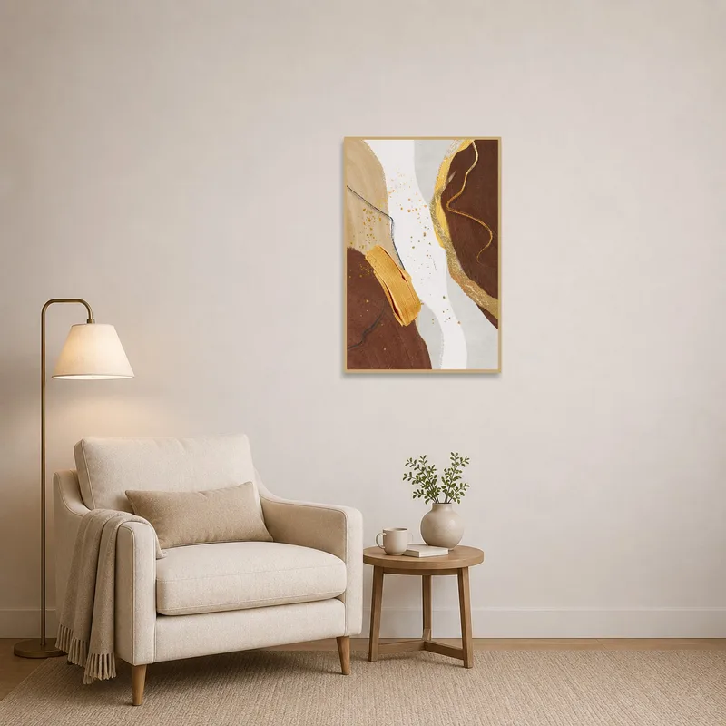 Reading corner featuring abstract art with earth tones and gold details.