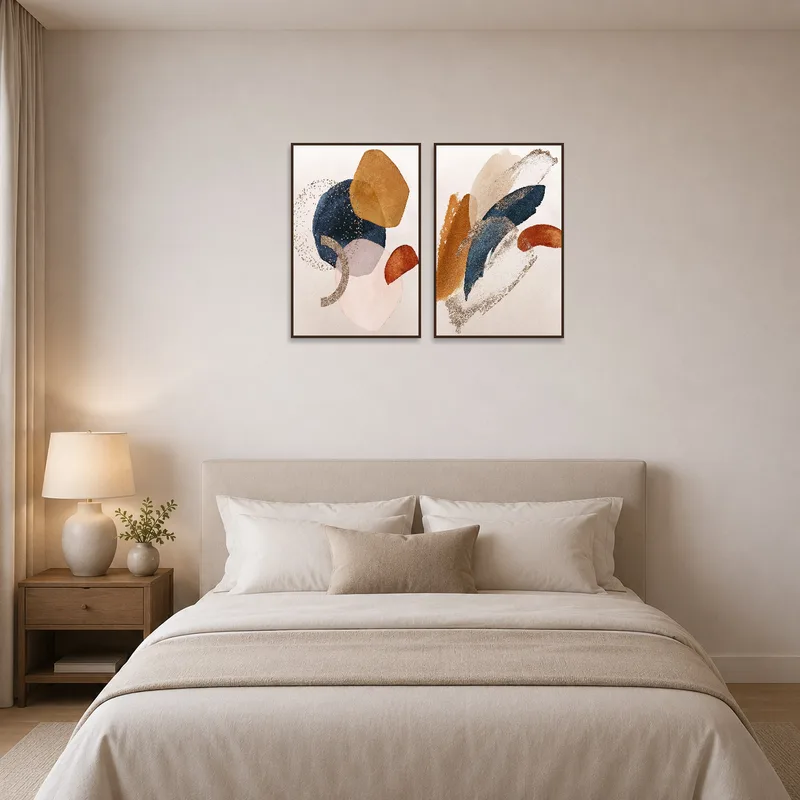 Abstract earthy tone prints bringing tranquility to a bedroom setting.