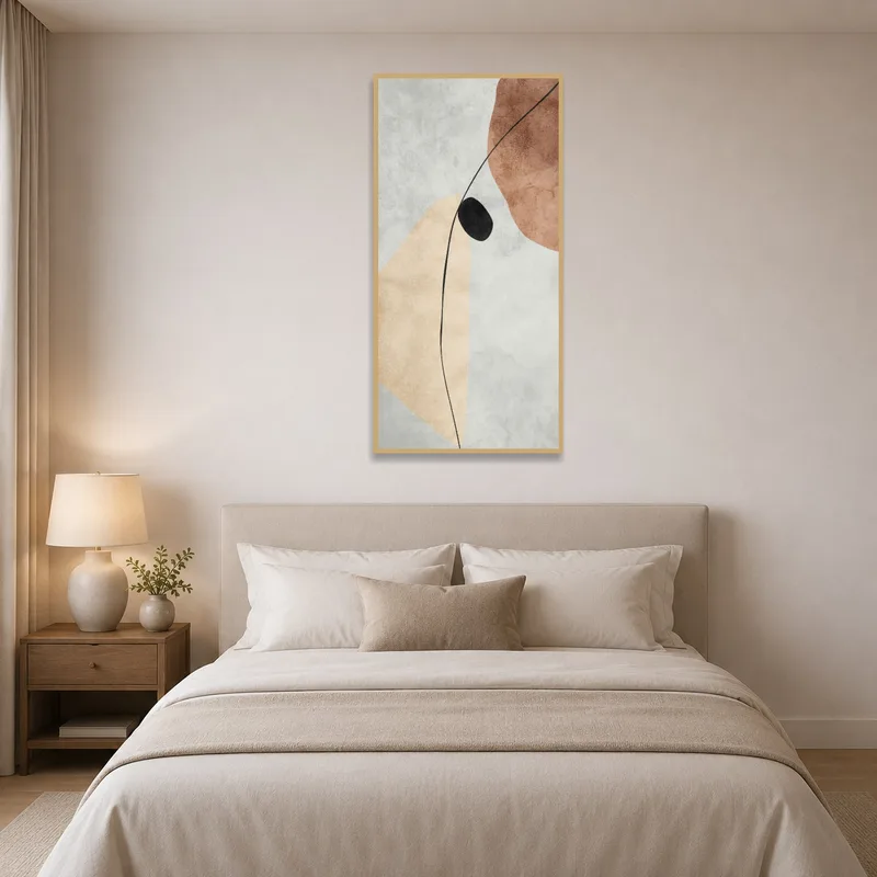 Earthy tones and black-accented abstract art bringing warmth above a bed in the bedroom.
