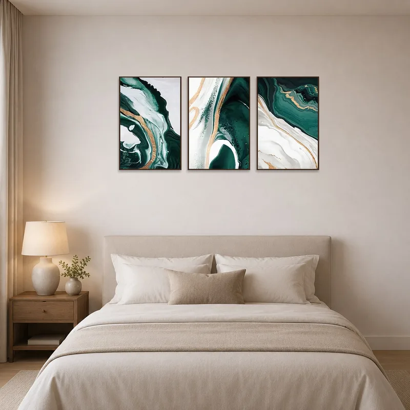 Bedroom ambiance enriched by abstract fluid art in emerald and gold.