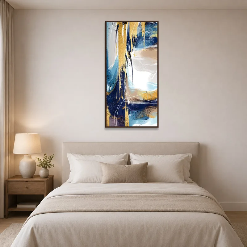Blue and gold expressionist canvas enhancing a serene bedroom.