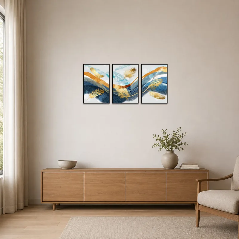 Simple room featuring a sleek abstract feather triptych.