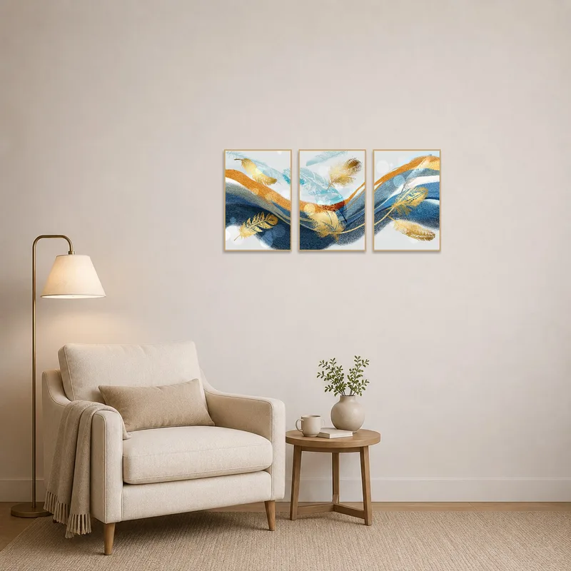 Blue and gold triptych adding elegance to a quiet reading corner.
