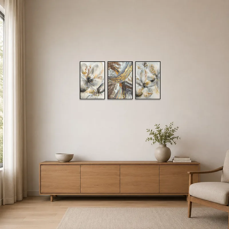 Minimalist room with abstract floral and geometric canvas set adding a hint of color.