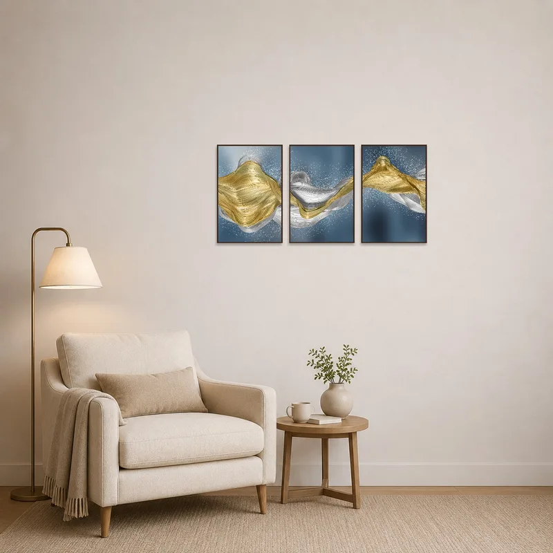 Abstract gold and silver artwork adds sophisticated elements to a cozy reading corner.