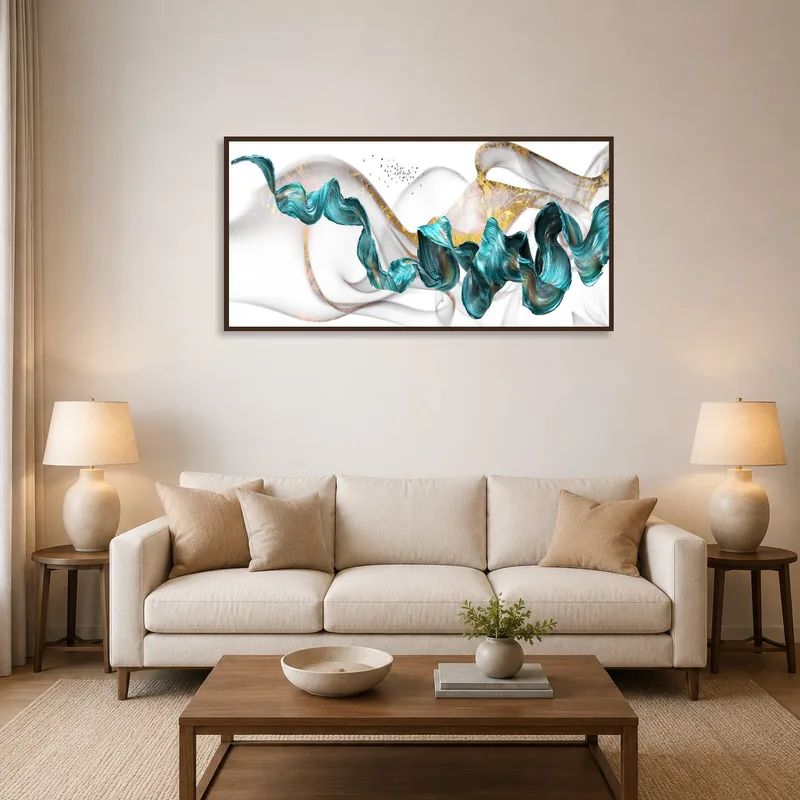 The artwork with gold accents adds movement to the living room's aesthetic.
