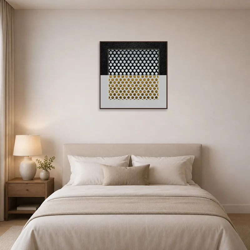 Bedroom adorned with gold and silver geometric circles art, placed above a low-set bed.