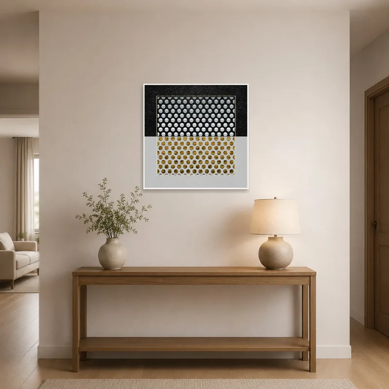 Entrance hall showcasing geometric circles artwork in gold and silver beside a sleek console table.