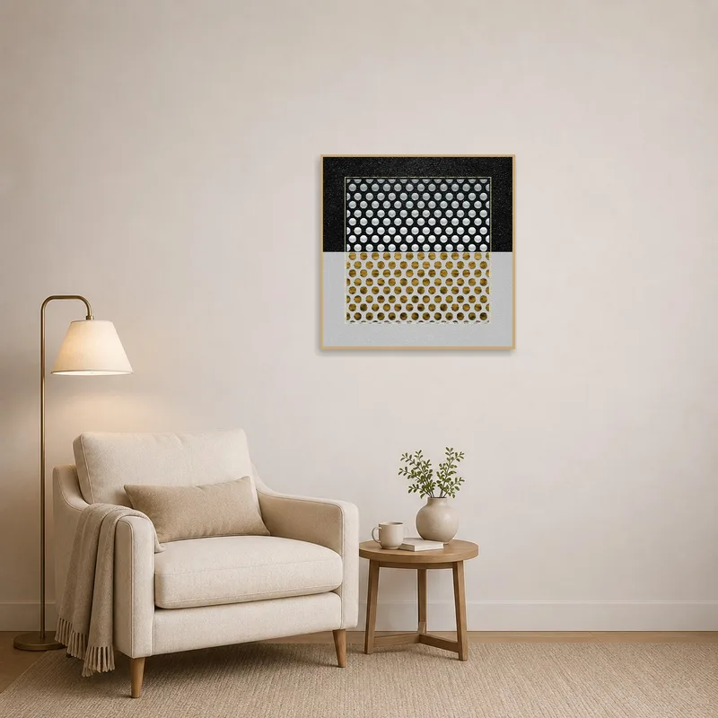 Reading corner with geometric circles in gold and silver, hanging beside a cozy armchair.