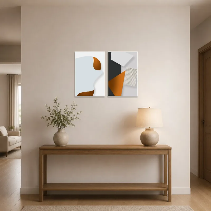 Geometric wall art set welcoming guests in an entrance hall with a side table.