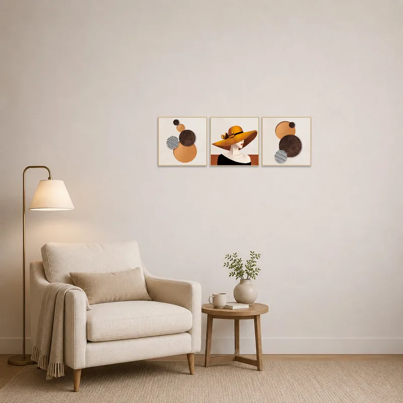 Triptych of hats and geometric shapes creates a sophisticated vibe in a quiet reading corner.