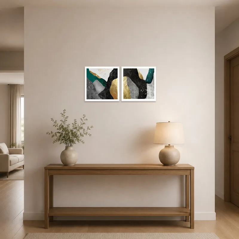 Geometric duo art with gold details in an entrance hall.