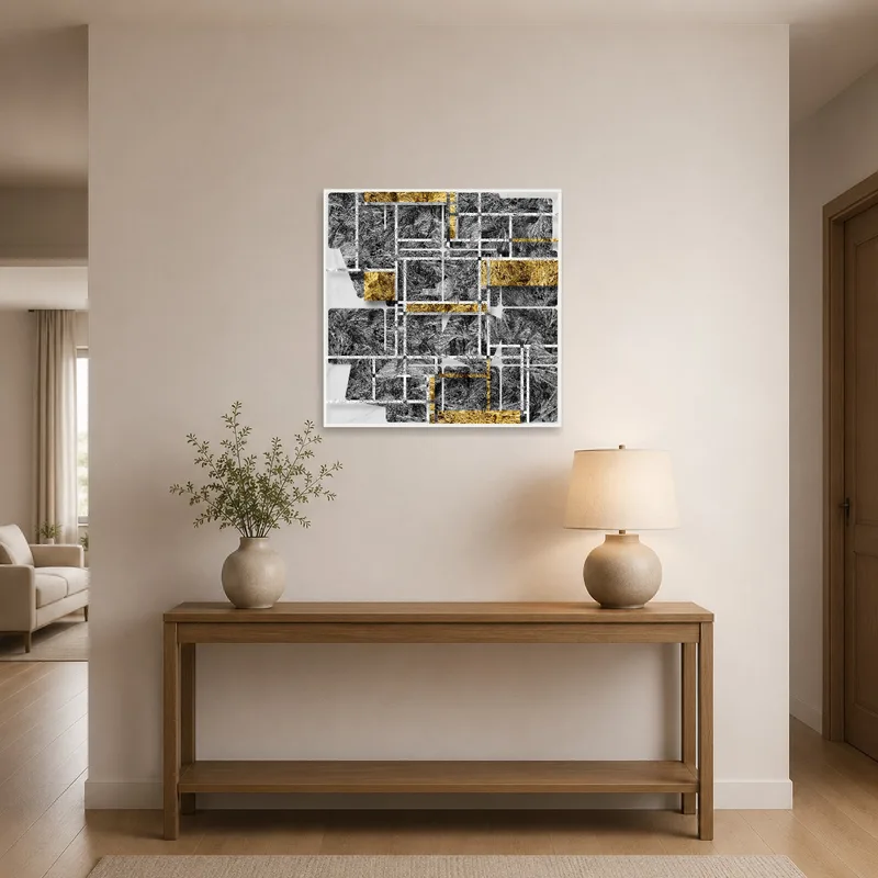 Entrance hall with abstract geometric art in gold and gray adding elegance to the space.