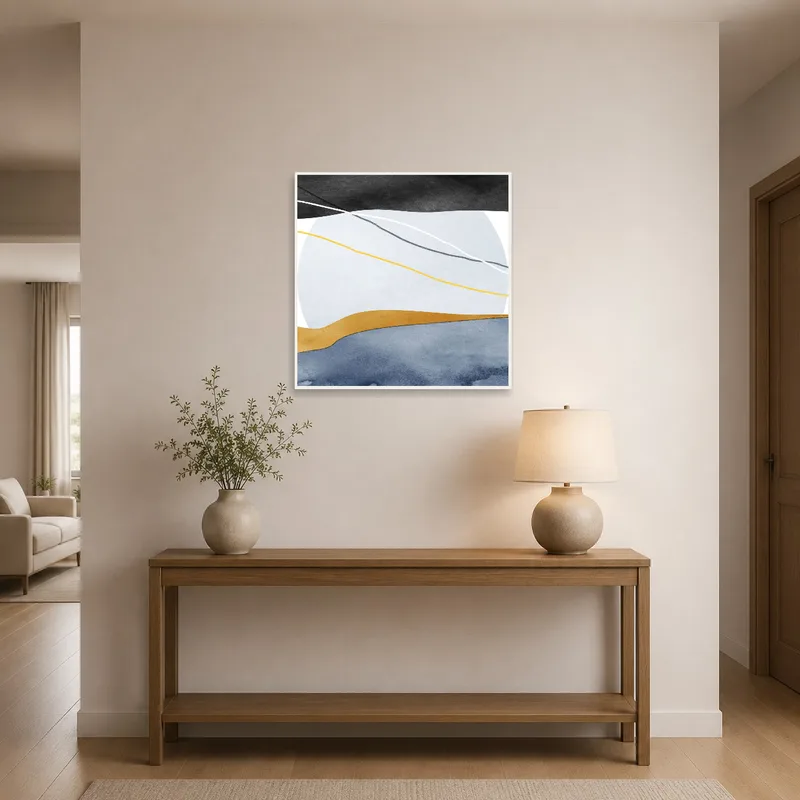 Earthy geometric landscape art brings warmth to the entrance hall.