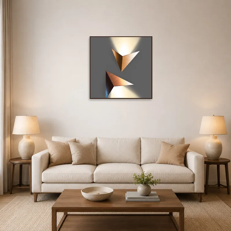 Abstract geometric design on wall above modern living room couch.