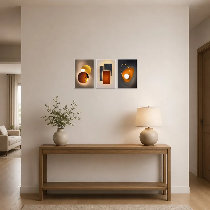 Entrance hall showcasing a geometric light and shadow triptych set welcoming guests.