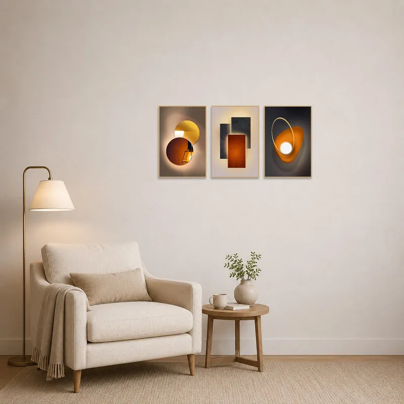 Reading corner adorned with a geometric light and shadow triptych adding depth.