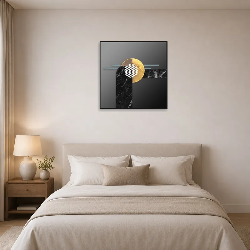 Abstract geometric marble and gold print above a bed in a stylish bedroom.