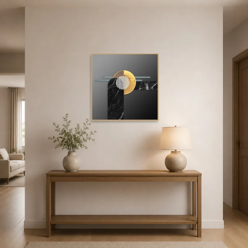 Abstract geometric marble and gold print in an entrance hall over a console table.