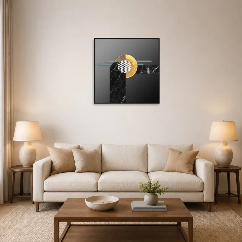 Abstract geometric marble and gold print above a modern living room sofa.