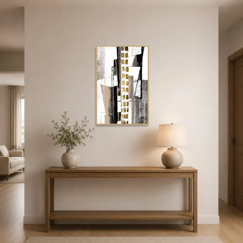 Abstract geometric art in the entrance hall beside a sleek console table.