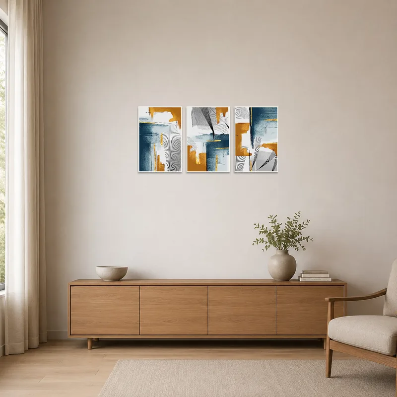 Minimalist setting showcasing a blue and gold abstract triptych.