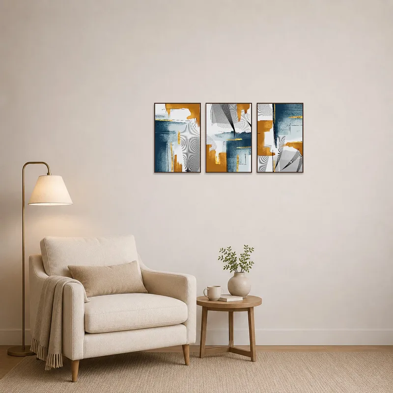 Reading corner adorned with a blue and gold abstract geometric triptych.