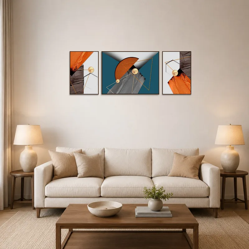 Abstract geometric triptych with bold hues adorns a living room wall above a modern sofa.