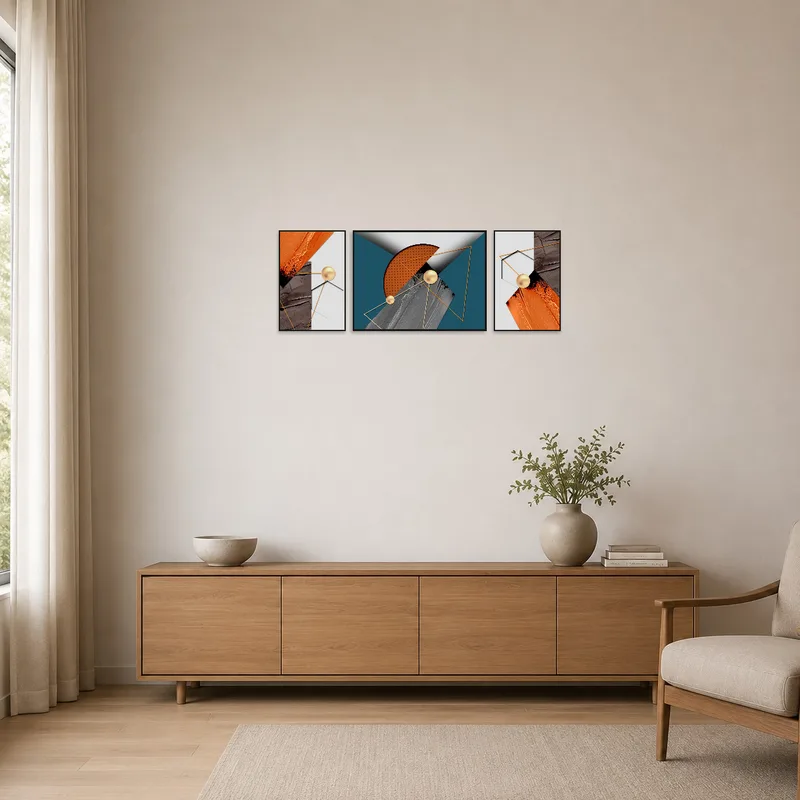 Bold geometric triptych adds a splash of color to a minimalist room with sleek lines.