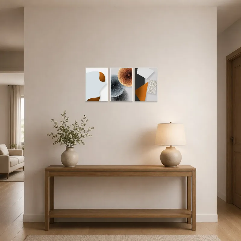 Geometric triptych with earthy colors welcoming guests in the entrance hall.