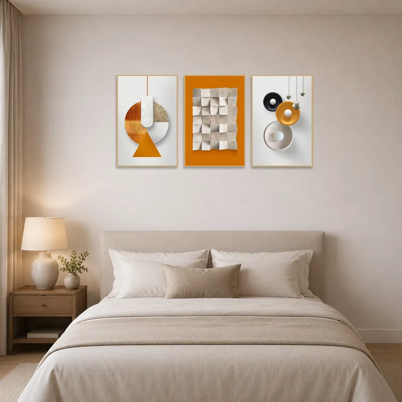 Geometric triptych in earthy hues creates a soothing bed backdrop.