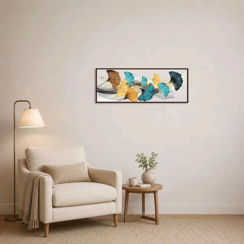 Abstract ginkgo leaf art in blue and gold adding elegance to a cozy reading corner.